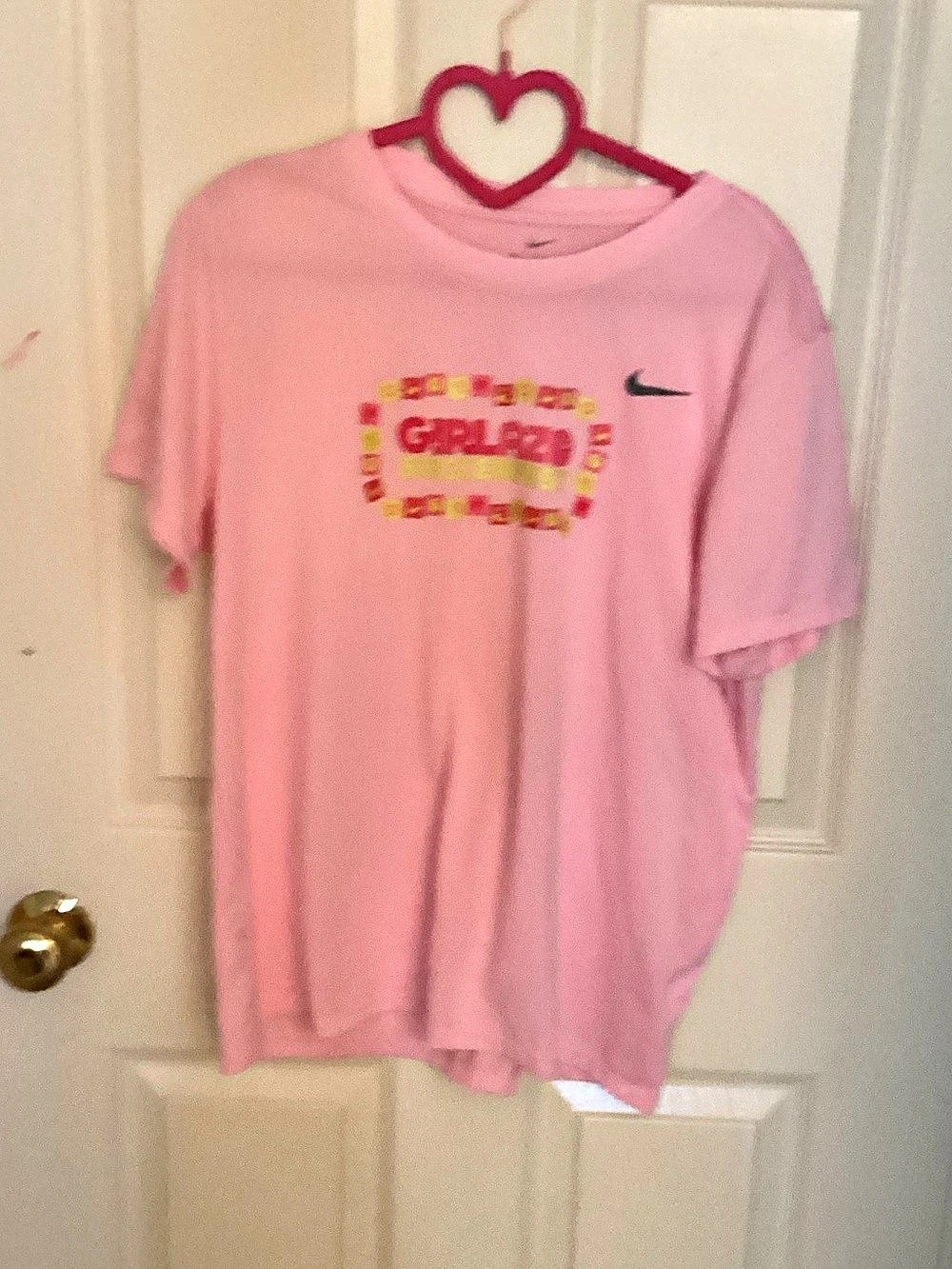 Nike Short Sleeve Graphic Tee in Pink
